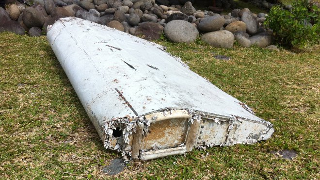 Plane Piece  Found On Beach On Reunion Island.-Missing MH370 Flight?