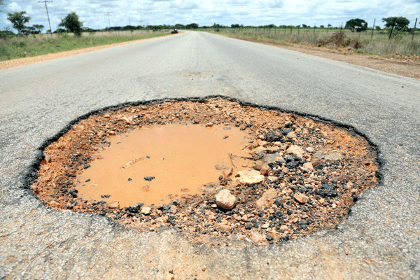SEVEN haulage trucks grounded on Harare-Masvingo Highway due to potholes,..WELCOME TO ZIMBABWE!