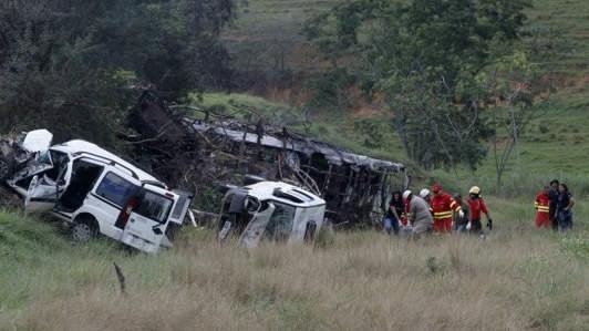 TWENTY one killed, thirty injured in pile up in  southeastern Brazil  causing bus split into two on impact and  fire
