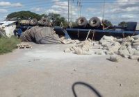 AN SA registered haulage truck overturned in Entumbane , Bulawayo and spilled nearly six tonnes of hazardous substances